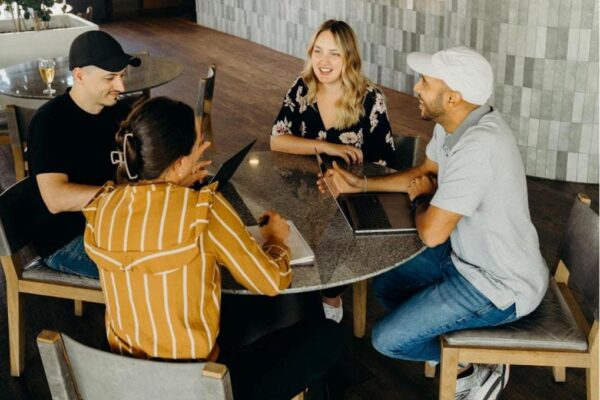 Group of professionals using cloud-based fax infrastructure to enhance security and compliance.