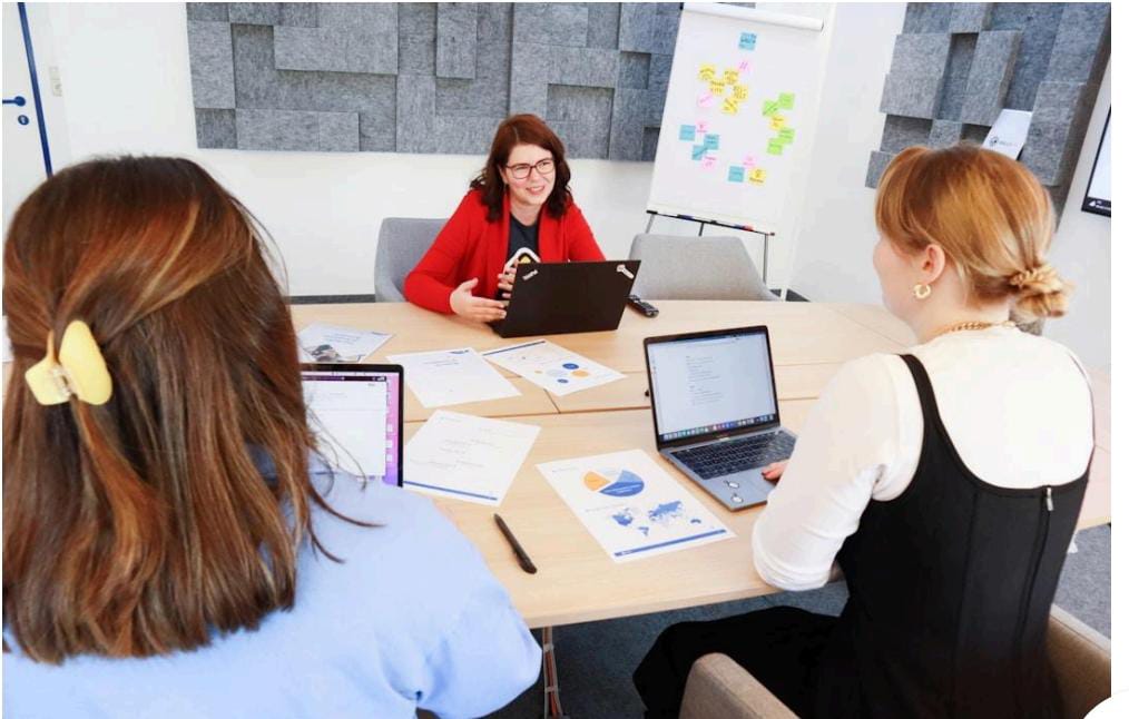 Team members streamlining workflow and boosting efficiency using cloud-based fax infrastructure.